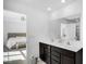 Modern bathroom with double vanity and a view into the bedroom at 17935 Paula, Westfield, IN 46074