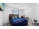 Bedroom with a double bed, TV, and accent chair at 17935 Paula, Westfield, IN 46074