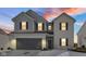 Two-story home with gray and white exterior, and a gray two-car garage at 17935 Paula, Westfield, IN 46074