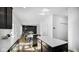 Open concept kitchen with island, looking into dining and living areas at 17935 Paula, Westfield, IN 46074