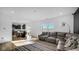 Open concept living room with kitchen view, and access to a deck at 17935 Paula, Westfield, IN 46074