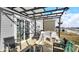 Covered patio with seating, playset, and access to the house at 17935 Paula, Westfield, IN 46074
