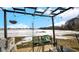 Relaxing patio with pergola, seating, and open field view at 17935 Paula, Westfield, IN 46074