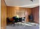 Simple dining area with wood paneling and table for four at 2147 W 65Th St, Indianapolis, IN 46260