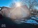 Attached garage with brick exterior and white door at 2147 W 65Th St, Indianapolis, IN 46260