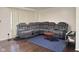 Living room with sectional sofa and hardwood floors at 2147 W 65Th St, Indianapolis, IN 46260