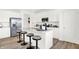 White kitchen with stainless steel appliances and an island at 2765 Linwood Ave, Greenwood, IN 46143