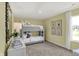 Bright bedroom with built-in bunk beds, a dresser, and plenty of natural light at 3872 Branch Cir, Franklin, IN 46131