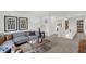 Comfortable loft with sectional sofa, coffee table, and shiplap walls at 3872 Branch Cir, Franklin, IN 46131