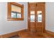Grand entry with original wood doors and hardwood floors at 404 N State St, Greenfield, IN 46140