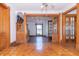 Grand entryway with hardwood floors and ornate woodwork at 404 N State St, Greenfield, IN 46140