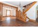 Stunning entryway with hardwood floors and staircase at 404 N State St, Greenfield, IN 46140