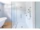 Spa-like shower with marble tile and rainfall shower head at 404 N State St, Greenfield, IN 46140