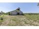 Barn featuring a weathered exterior with a rustic charm and ample storage space at 4462 S Morgantown Rd, Greenwood, IN 46143