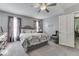 Comfortable bedroom with a queen-size bed and plenty of natural light at 4462 S Morgantown Rd, Greenwood, IN 46143