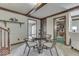 Cozy dining area with a round glass table and four chairs at 4462 S Morgantown Rd, Greenwood, IN 46143