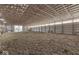 Large indoor riding arena with dirt floor at 4462 S Morgantown Rd, Greenwood, IN 46143