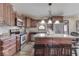 Updated kitchen featuring stainless steel appliances and an island with seating at 4462 S Morgantown Rd, Greenwood, IN 46143