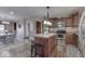 Spacious kitchen with stainless steel appliances and an island with bar stools at 4462 S Morgantown Rd, Greenwood, IN 46143