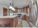Eat-in kitchen with stainless steel appliances and an island at 4462 S Morgantown Rd, Greenwood, IN 46143