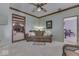 Bright living room featuring a brown couch and views to other rooms at 4462 S Morgantown Rd, Greenwood, IN 46143