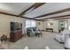 Bright living room with a large TV and comfortable seating at 4462 S Morgantown Rd, Greenwood, IN 46143