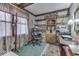 Home office with a desk, chair, and built-in shelving at 4462 S Morgantown Rd, Greenwood, IN 46143