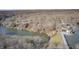 Aerial view of a lakeside community, showcasing waterfront properties and a road bridge at 459 W Lakeview Dr, Nineveh, IN 46164