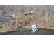 Aerial view of a home with stairs down to a dock, boats, and lake access at 459 W Lakeview Dr, Nineveh, IN 46164