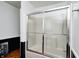 Clean bathroom with a shower/tub combo and a sliding glass door at 459 W Lakeview Dr, Nineveh, IN 46164