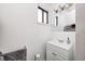 Small bathroom includes a sink, toilet, and mirror at 459 W Lakeview Dr, Nineveh, IN 46164