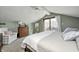 Relaxing bedroom with a king-size bed, access to a balcony, and a ceiling fan at 459 W Lakeview Dr, Nineveh, IN 46164