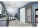 Cozy bedroom with a comfortable bed, dresser, and access to upper level at 459 W Lakeview Dr, Nineveh, IN 46164