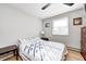 Simple bedroom with a double bed, nightstand, and window with blinds at 459 W Lakeview Dr, Nineveh, IN 46164