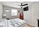 Cozy bedroom with a double bed, dresser, and ceiling fan at 459 W Lakeview Dr, Nineveh, IN 46164