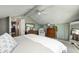 Primary bedroom with a king bed, dresser, and access to another room at 459 W Lakeview Dr, Nineveh, IN 46164