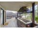 Covered grilling area on a spacious deck with lake views at 459 W Lakeview Dr, Nineveh, IN 46164