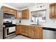 Kitchen with stainless steel appliances and wood cabinets at 459 W Lakeview Dr, Nineveh, IN 46164