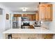 Modern kitchen with stainless steel appliances and white quartz countertops at 459 W Lakeview Dr, Nineveh, IN 46164