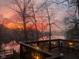 Deck with lake view at sunrise, string lights at 459 W Lakeview Dr, Nineveh, IN 46164