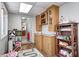Playroom with wooden cabinets, a play kitchen, and a view to the kitchen at 459 W Lakeview Dr, Nineveh, IN 46164