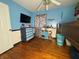 Charming bedroom with hardwood floors and dresser at 4905 W Southern Ave, Indianapolis, IN 46241