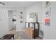 Entryway with mirror, console table, and wicker storage bin at 5772 Weeping Willow Pl, Whitestown, IN 46075