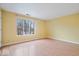 Well-lit bedroom featuring laminate floors and a window at 581 W Hunters Dr # Apt D, Carmel, IN 46032