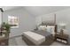 Spacious bedroom with wood bed frame, neutral color palette, and an accent wall at 6602 Caroline Ave, Indianapolis, IN 46220