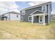 The backyard has a covered patio at 7541 Big Bend Blvd, Camby, IN 46113