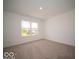 Bright bedroom with a large window providing natural light at 7541 Big Bend Blvd, Camby, IN 46113