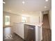 Open kitchen concept with a large island, stainless steel dishwasher, and modern fixtures at 7541 Big Bend Blvd, Camby, IN 46113