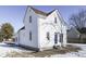 White house with a red roof and charming front porch at 7748 Hotze St, Indianapolis, IN 46259