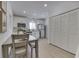 Bright kitchen with white shaker cabinets, stainless steel appliances, and wood countertops at 7748 Hotze St, Indianapolis, IN 46259